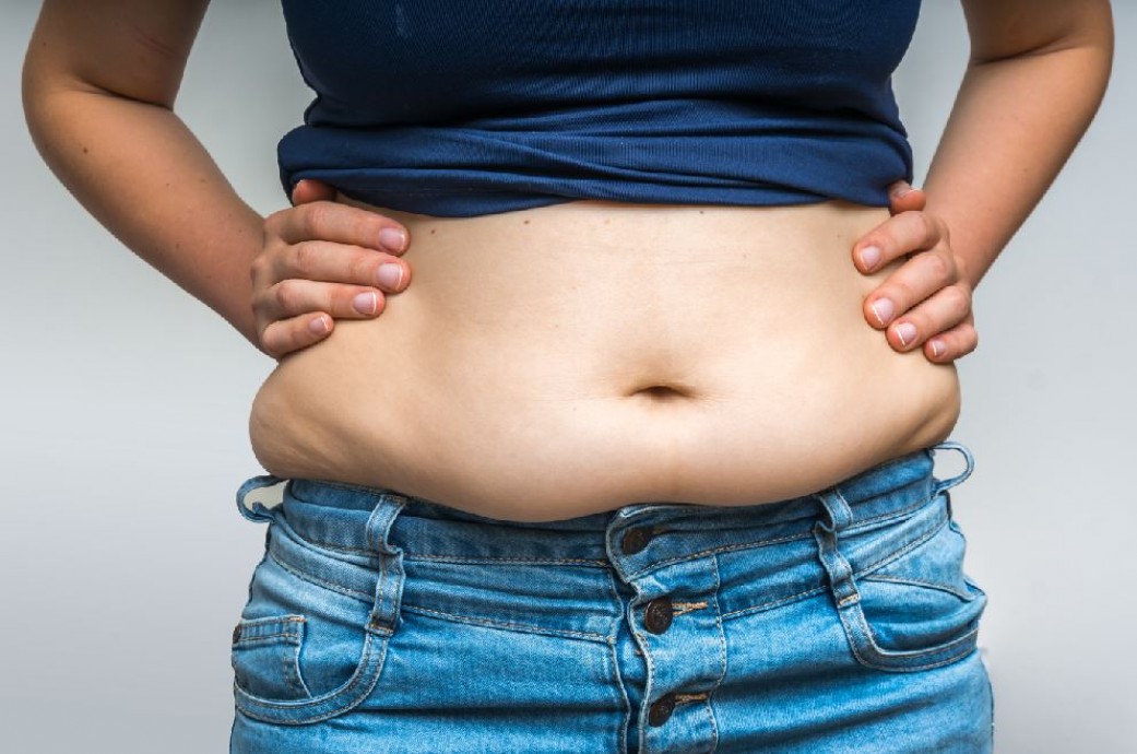 Почему жир накапливается в области живота?
